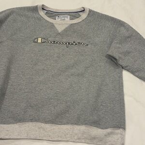 Selling this cute champion sweatshirt that can be worn to any casual event!!